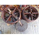 SIX MATCHING CAST IRON CART WHEELS ETC.