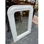 A SMALL PAINTED WALL MIRROR.