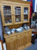 A MODERN PINE KITCHEN DRESSER.