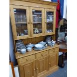 A MODERN PINE KITCHEN DRESSER.