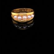 AN ANTIQUE 18ct GOLD HALLMARKED GRADUATING PEARL HALF HOOP RING. DATED 1879, LONDON. FINGER SIZE