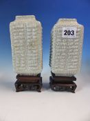 A PAIR OF CHINESE GREY CRACKLEWARE CONG SHAPED VASES WITH WOOD STANDS. H 14cms.