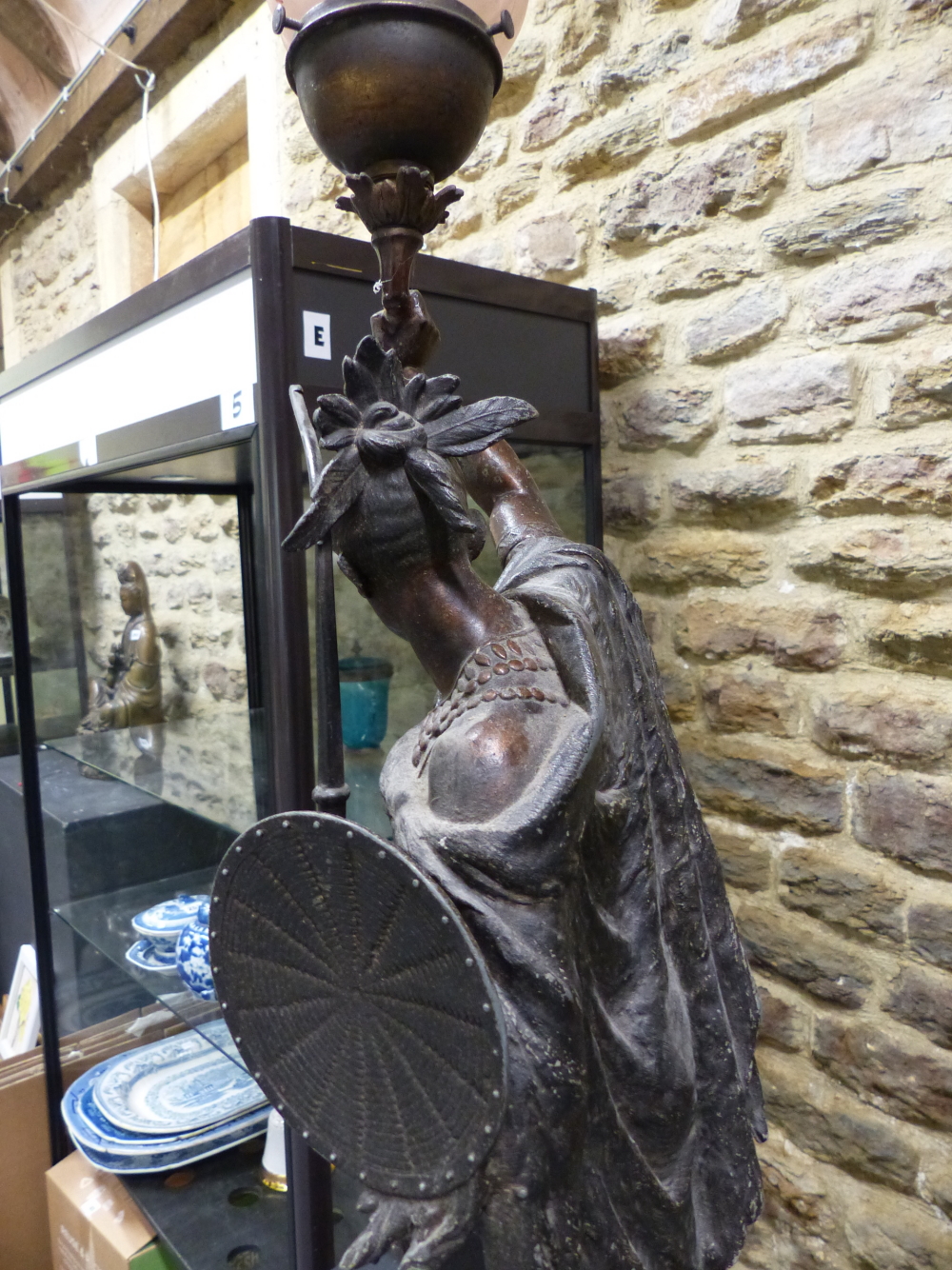 A SPELTER FIGURAL LAMP CAST AS AN AMERICAN INDIAN WITH BOW AND SHIELD IN HIS LEFT HAND WHILE THE - Image 9 of 9