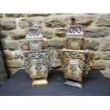 A PAIR OF CHINESE HARDSTONE TWO HANDLED VASES AND COVERS, THE BALUSTER SHAPES OF RECTANGULAR