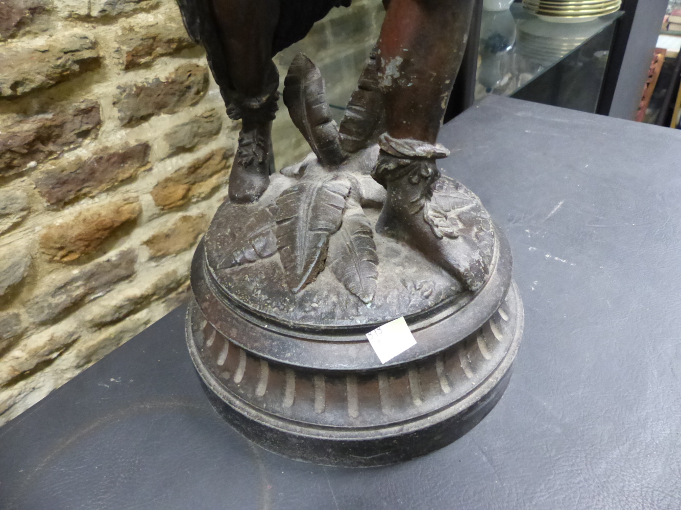 A SPELTER FIGURAL LAMP CAST AS AN AMERICAN INDIAN WITH BOW AND SHIELD IN HIS LEFT HAND WHILE THE - Image 5 of 9