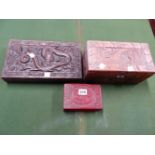 A CHINESE CINNABAR LACQUER BOX, THE RECTANGULAR LID WITH CENTRAL DRAGON AND PHOENIX OVAL. W 14cms.