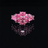 A 9ct WHITE GOLD PINK GEMSTONE CLUSTER DRESS RING, FINGER SIZE N, WEIGHT, WEIGHT 3.7grms.