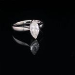 A MARQUIS CUT DIAMOND SINGLE STONE PLATINUM RING. FINGER SIZE N. WEIGHT 5.4grms,