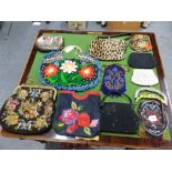 A COLLECTION OF ELEVEN EMBROIDERED AND BEADED HANDBAGS