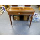 A CROSS BANDED VICTORIAN ROSEWOOD GAMES TABLE, TWO OF THE TAPERING CYLINDRICAL FLUTED LEGS DRAWING