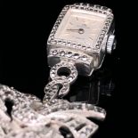A CONTINENTAL SILVER AND MARCASITE MANUAL WOUND BUCHERER BROOCH FOB WATCH.