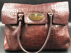 MULBERRY HANDBAG. A DESIGNER CROC PRINT LEATHER BAYSWATER MAROON HAND BAG, WITH DUST COVER.