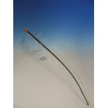 A RIDING CROP MOUNTED WITH GILT METAL BAND AND POMMEL, THE LATTER INSET WITH WHITE AGATE. W 53cms.