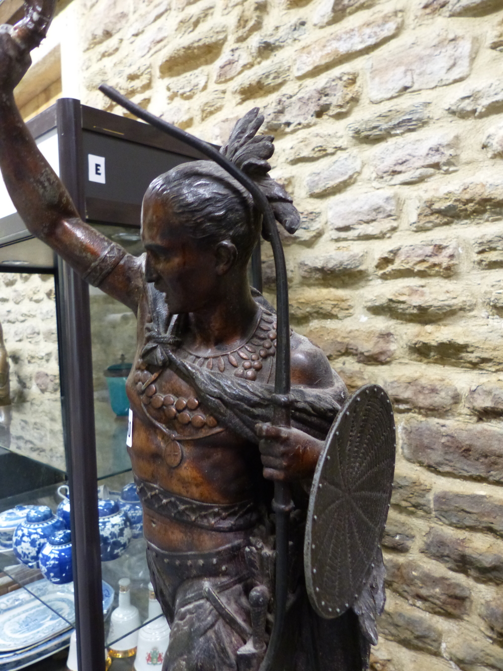 A SPELTER FIGURAL LAMP CAST AS AN AMERICAN INDIAN WITH BOW AND SHIELD IN HIS LEFT HAND WHILE THE - Image 7 of 9