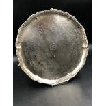 A GEORGIAN HALLMARKED SILVER THREE FOOTED SALVER, ARMORIAL ENGRAVED, DATED 1774 LONDON. DIAMETER