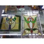 TWO PAIRS OF ART NOUVEAU PANELS OF LEADED STAINED GLASS. 67.5 x 44 AND 43.5 x 48cms.