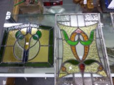 TWO PAIRS OF ART NOUVEAU PANELS OF LEADED STAINED GLASS. 67.5 x 44 AND 43.5 x 48cms.