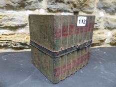 A HUNTLEY AND PALMERS BISCUIT TIN MODELLED AS EIGHT VOLUMES BY DICKENS BOUND TOGETHER BY A BELT. H