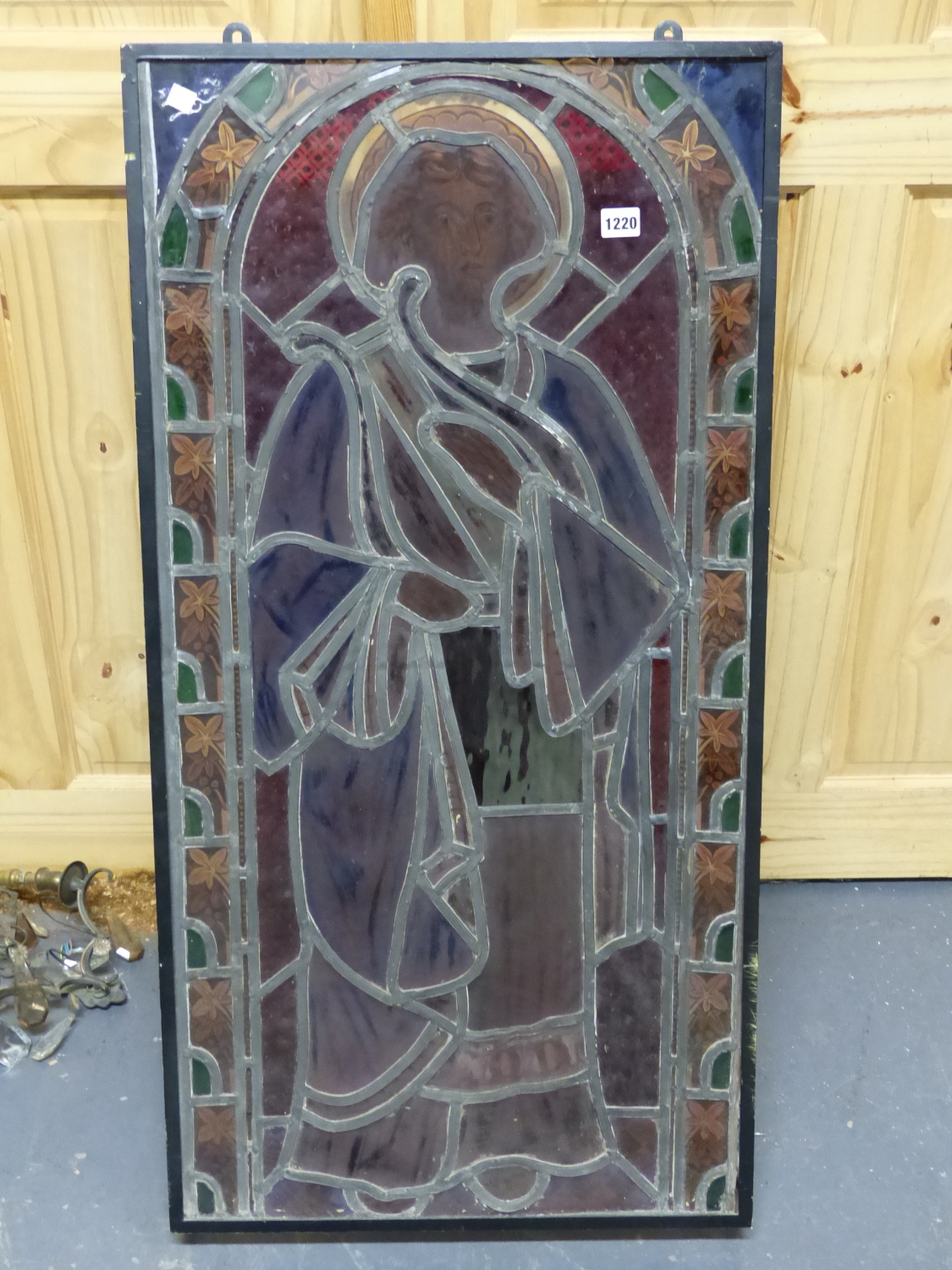 A VICTORIAN STAINED GLASS PANEL OF A SAINT STANDING IN A ROUND ARCHED NICHE, THE LEADED GLASS - Image 3 of 4