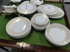 A ROSENTHAL GOLDEN RAYS PATTERN TWENTY NINE PIECE DINNER SERVICE DESIGNED BY RAYMOND LOEWY CIRCA