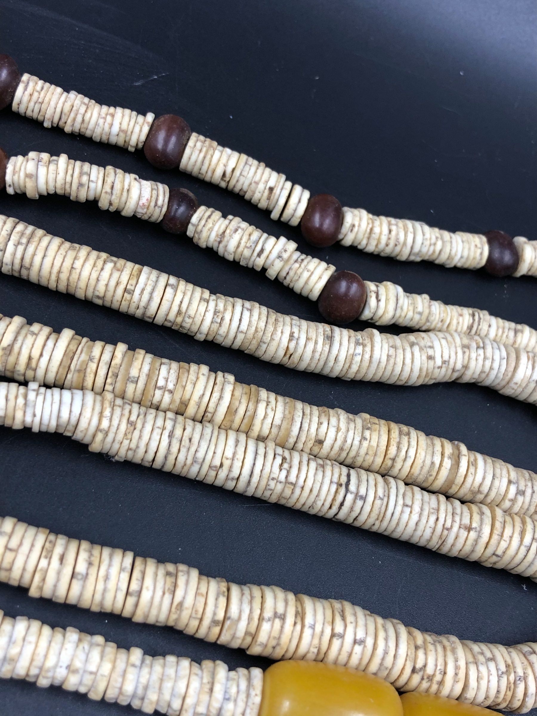 NINE STRANDS OF ETHNIC BEADED NECKLETS TO INCLUDE AMBER, BONE, IRON ETC. - Image 14 of 15