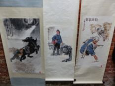 A CHINESE SCROLL PAINTING OF A SOLDIER PUSHING A HORSE AWAY FROM AN APPROACHING TRAIN. 99.5 x 55cms.