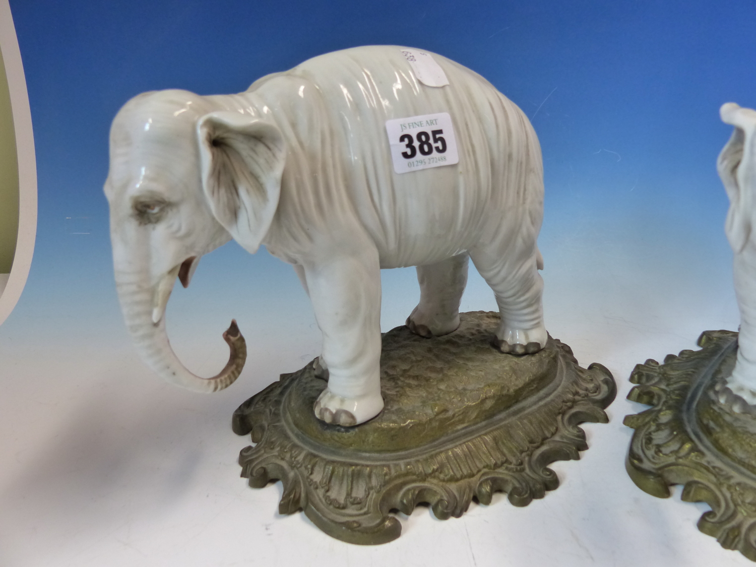 A PAIR OF ANTIQUE GERMAN PORCELAIN ELEPHANTS STANDING ON LATER ORMOLU BASES. W 26cms. - Image 2 of 8