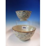 TWO NANKING CARGO CHINESE PROVINCIAL BLUE AND WHITE PAINTED WITH FLOWERING SCROLLING VINES. Dia.