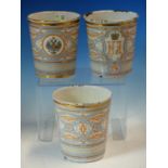 THREE ENAMEL BEAKERS COMMEMORATING THE 1896 CORONATION OF TSAR NICHOLAS II. H 10.5cms.