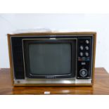 A SONY TRINITRON KV-1320UB COLOUR TELEVISION IN A BLONDE WOOD CASE WITH THE RECEIPT FROM 29/5/71.