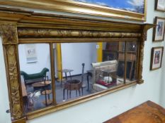 AN EARLY 19th C. THREE PLATE MIRROR, THE GILT FRAME WITH VINE ENTWINED COLUMN TO THE TOP AND
