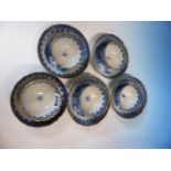 FIVE CHINESE BLUE AND WHITE TEA BOWLS, FOUR SAUCERS AND A LARGER BOWL