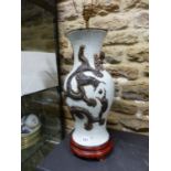 A CHINESE CRACKLEWARE BALUSTER VASE AS A LAMP WITH TWO BRONZED DRAGONS ON ONE SIDE OF THE CHERRY
