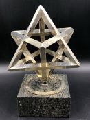 LESLIE GORDON DURBIN (1913 - 2005)- A HALLMARKED SOLID SILVER SPINNING STAR ON PLINTH AWARD, CONTA