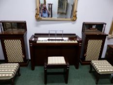 A PAIR OF ANTIQUE AND LATER ROSEWOOD SIDE CABINETS, THE RECESSED SHELF BACKS WITH BRASS THREE