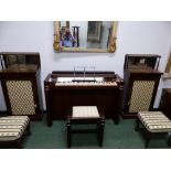 A PAIR OF ANTIQUE AND LATER ROSEWOOD SIDE CABINETS, THE RECESSED SHELF BACKS WITH BRASS THREE