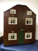 THE RECTORY COTTAGE, AN ANTIQUE THREE FLOOR DOLLS HOUSE WITH A WINDOW ONTO EACH OF THE SIX ROOMS,