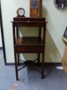 A GEORGE III AND LATER MAHOGANY WASH STAND, THE RECTANGULAR TOP OVER A TIER, A DRAWER AND THE JUG