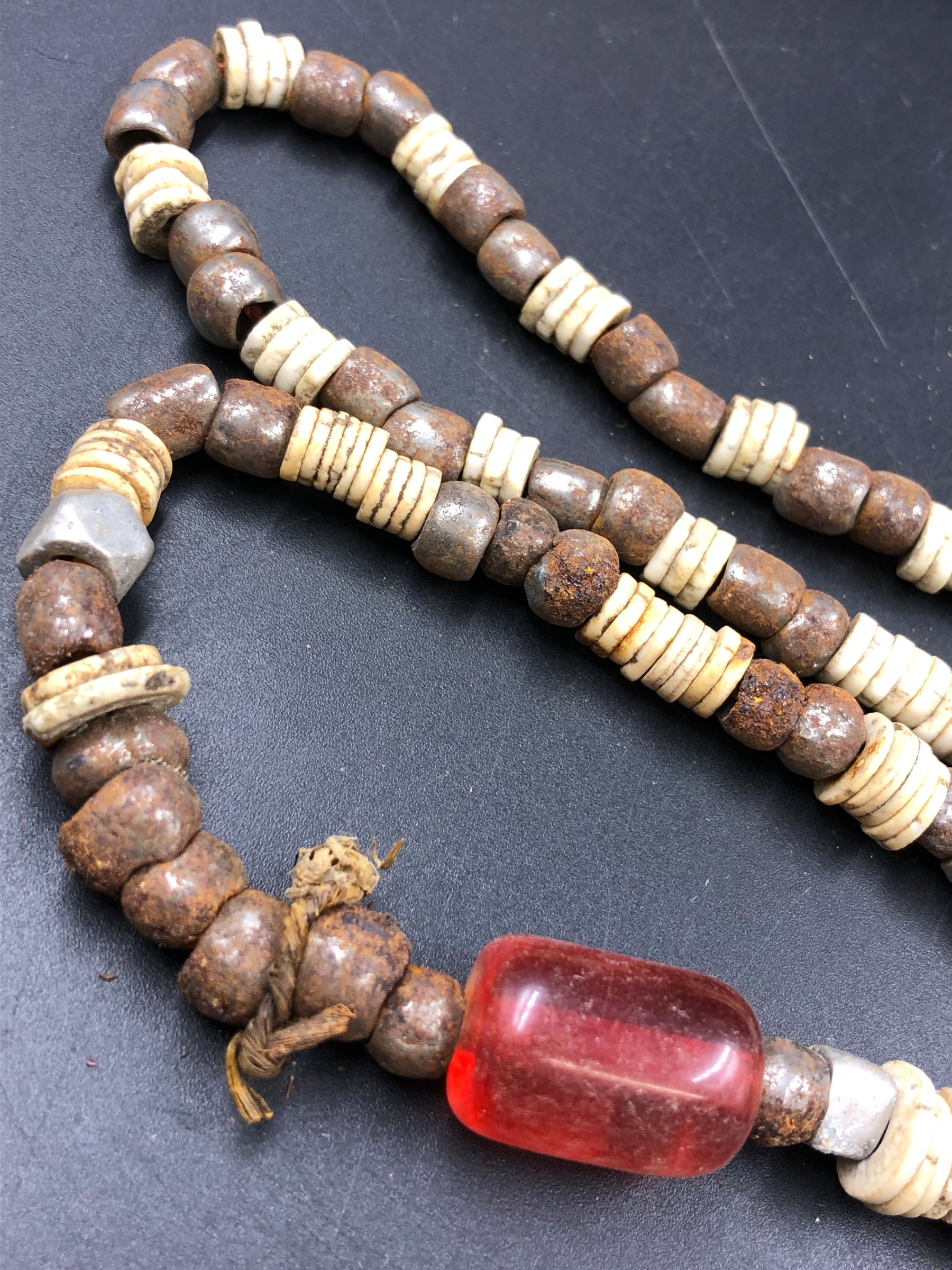 NINE STRANDS OF ETHNIC BEADED NECKLETS TO INCLUDE AMBER, BONE, IRON ETC. - Image 3 of 15