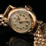 A 9ct GOLD J.W.BENSON, LONDON, LADIES WRIST WATCH. MANUAL WOULD, WITH CHAMPAGNE DIAL. COMPLETE