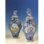 TWO 19th C. DUTCH DELFT POLYCHROME VASES AND COVERS OF FLATTENED BALUSTER SHAPE, ONE PAINTED WITH