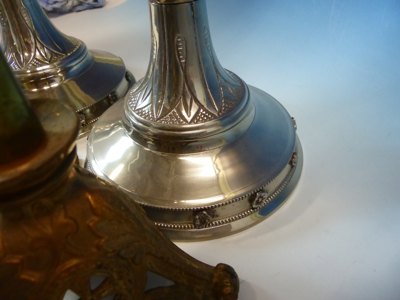 A PAIR OF NEOGOTHIC SILVERED PRICKET CANDLESTICKS. H 48.5cms. A PAIR OF PARCEL GOLD PAINTED BRASS - Image 6 of 6