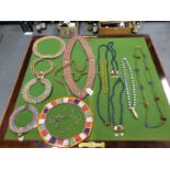 SIX KENYAN BEAD NECK PIECES TOGETHER WITH SEVEN BEAD NECKLACES