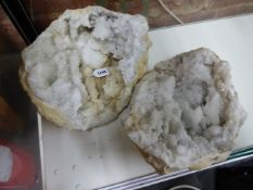 A QUARTZ GEODE IN TWO HALVES. W 36cms.