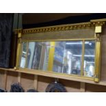 A 19th.C. THREE PLATE MIRROR WITH GILT BEADED CORNICE ABOVE FISH SCALE BAND AND PHAROAH PILASTERS. W