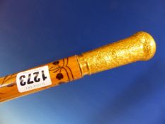 A FINE GOLD MOUNTED WALKING CANE THE SATINWOOD SHAFT INLAID WITH EXOTIC SPECIMEN WOOD IN A SPIRAL OF