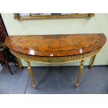 A GEORGE III STYLE DEMILUNE CONSOLE TABLE WITH CROSS BANDED MAHOGANY TOP, THE GILT APRON WITH