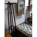 A PAIR OF ROSEWOOD HALL STANDS, EACH OF THE CRUCIFORM HAT PEG TOPS TO FOUR COLUMNS MOUNTED WITH