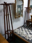 A PAIR OF ROSEWOOD HALL STANDS, EACH OF THE CRUCIFORM HAT PEG TOPS TO FOUR COLUMNS MOUNTED WITH