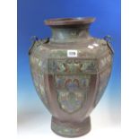 A CHINESE CHAMPLEVE ENAMELLED BRONZE HEXAGONAL SECTIONED BALUSTER VASE WITH MASK AND RING HANDLES